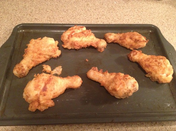 Once all the pieces have been fried, place them on a lightly greased backing sheet and bake them.