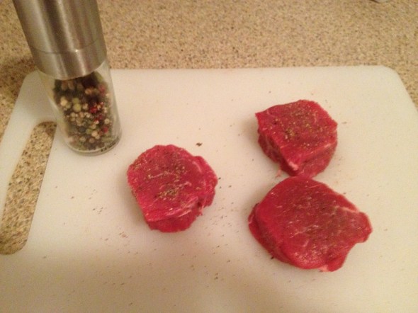 Sprinkle both sides of the steaks with freshly groung pepper.
